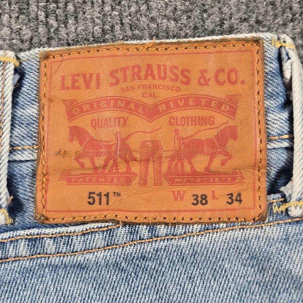 Levi's 511 Slim Jeans Mens 38x34 Light Blue Good Patchwork Distressed Denim y2k